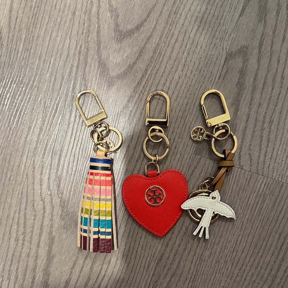 Tory Burch Red, White, and Multicolor Keychain Trio